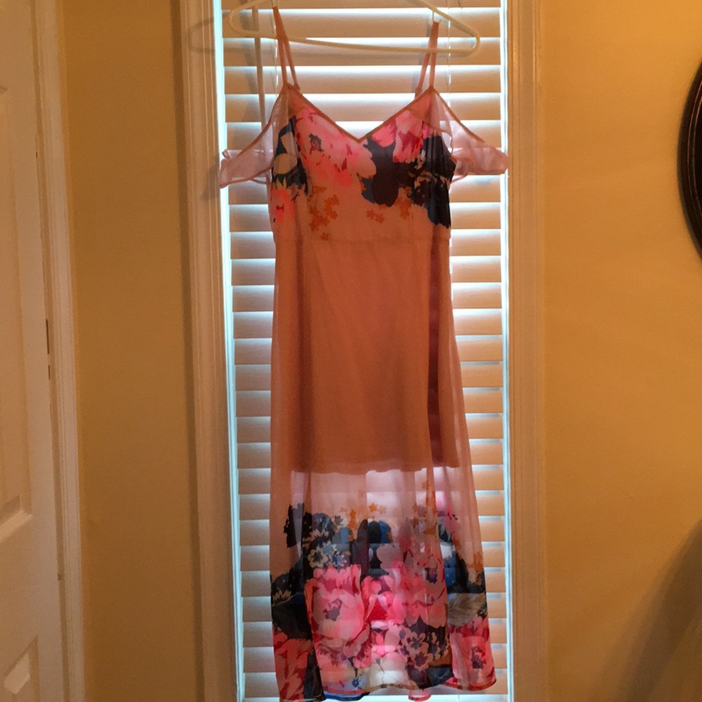 Blush dress with floral print.
